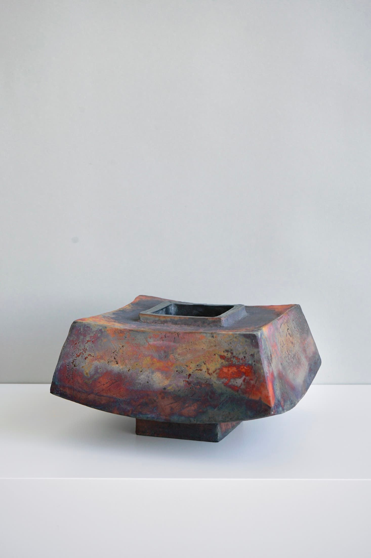 Square bowl with an iridescent raku glaze